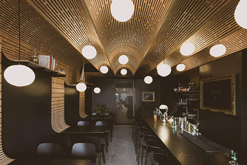 Дизайн бара Business & Pleasure со сводчатым потолком в Калгари